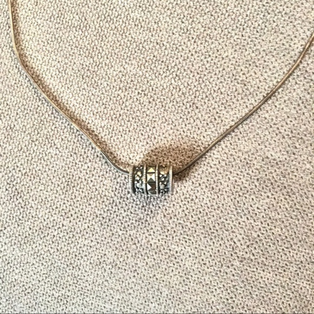 Spinner barrel pendant necklace